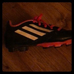 Black and pink Adidas soccer cleats